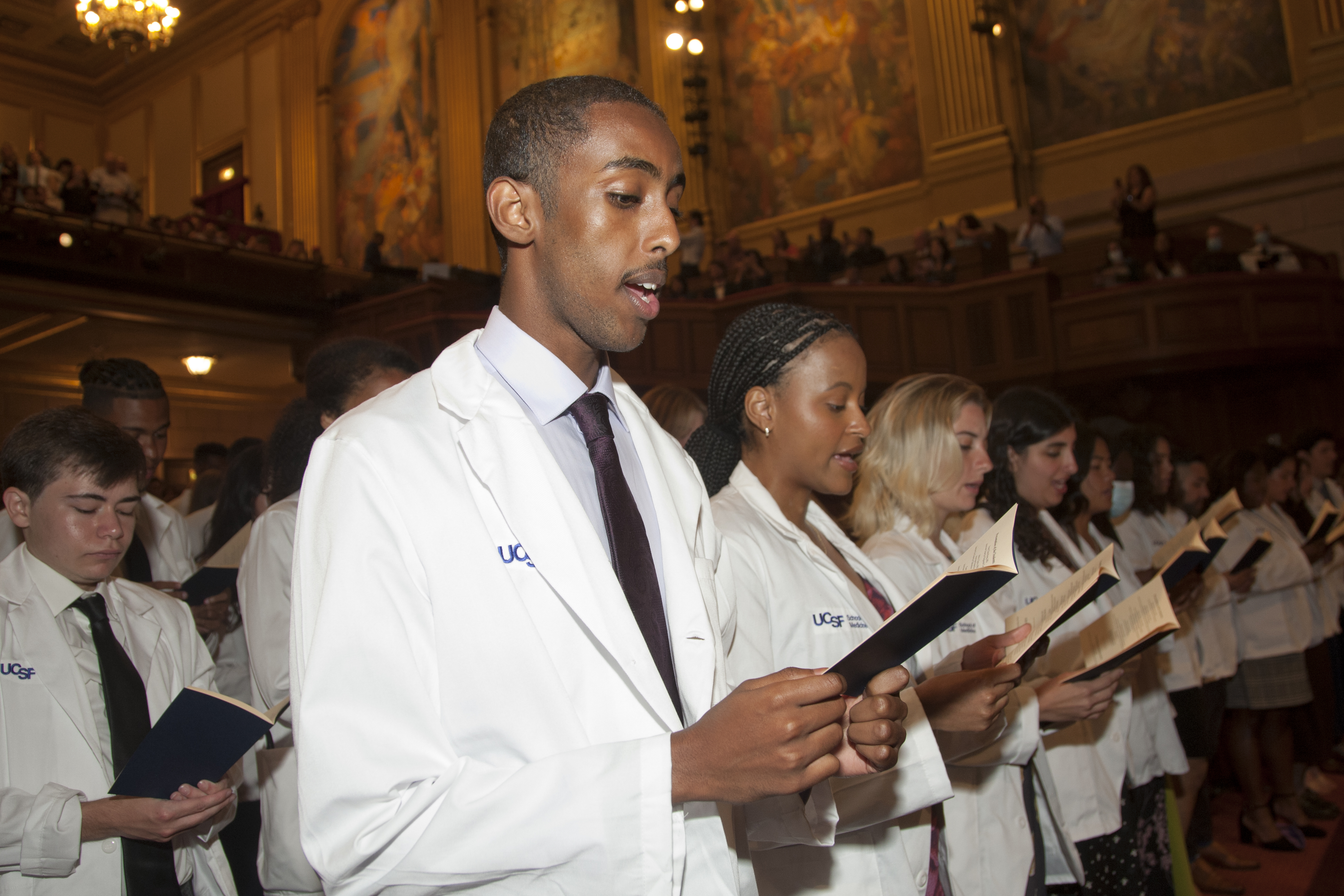 Members of the UCSF School of Medicine Class of 2027 recite the UCSF Physicians Declaration during the 2023 White Coat Ceremony