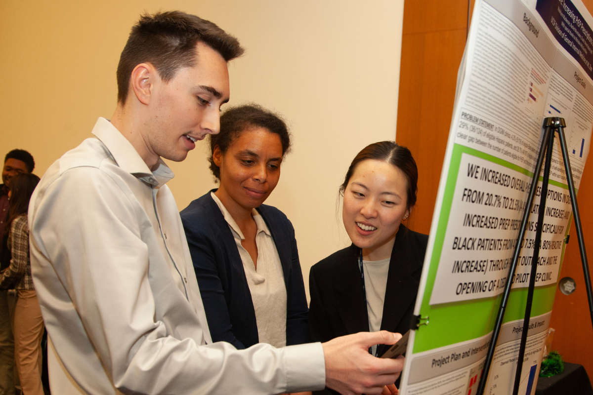 Medical Students Mitchell Koss, Aude Bouagnon and Kaitlyn Hsu in conversation at the 2024 UCSF School of Medicine Clinical Microsystems Clerkship Health Systems Improvement Symposium