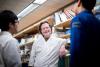 Dr. Lewis Lanier speaks with researchers in his lab in 2016. Photo by Noah Berger.