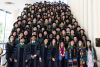 The class of 2026 poses on the stairs at Davies Symphony Hall.